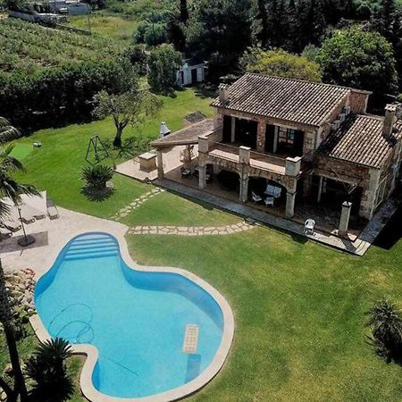 Ciclismo y golf junto a la playa Finca Son Sant Martí Gran Muro Exterior foto