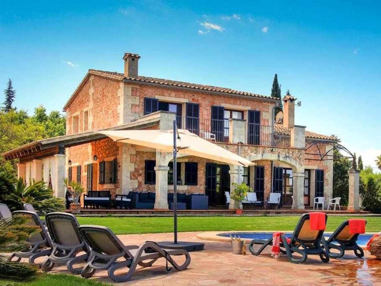 Ciclismo y golf junto a la playa Finca Son Sant Martí Gran Muro Exterior foto